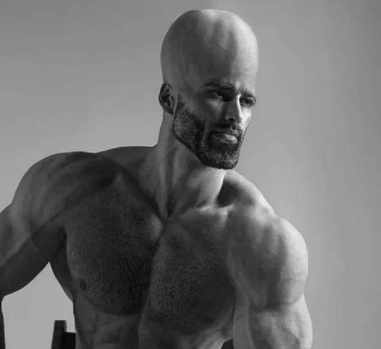 Muscular man with a large head in black and white.