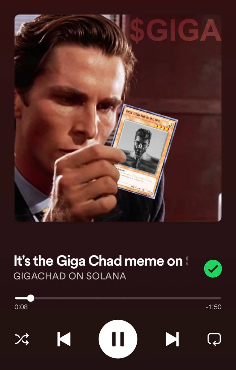 Man looking at Giga Chad trading card with focus.