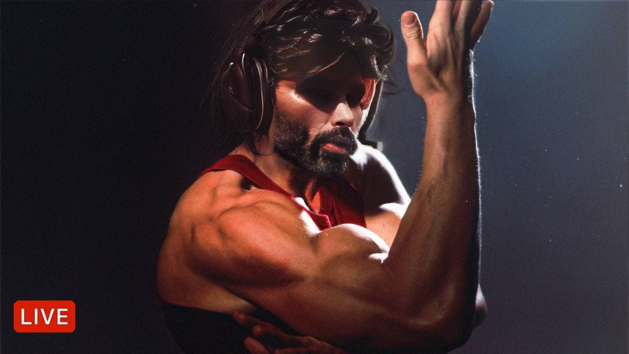 Muscular man flexing with headphones, 'LIVE' banner present.
