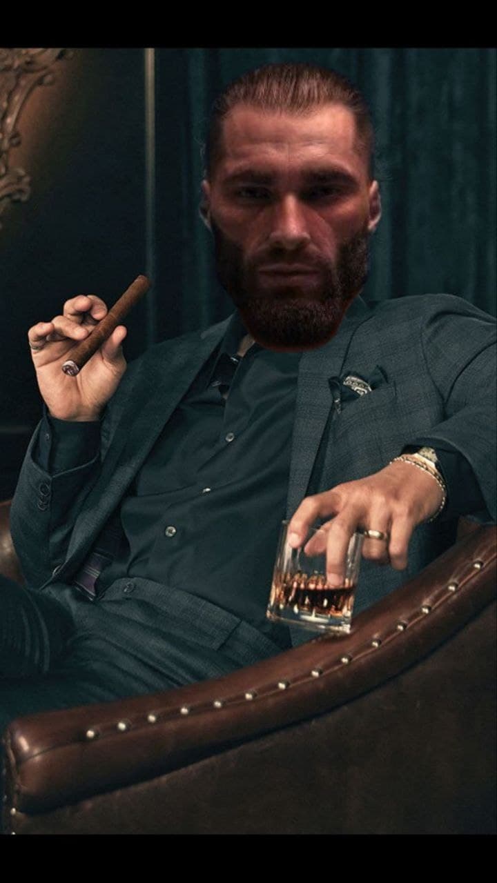 Man with cigar and whiskey, oozing confidence and style.