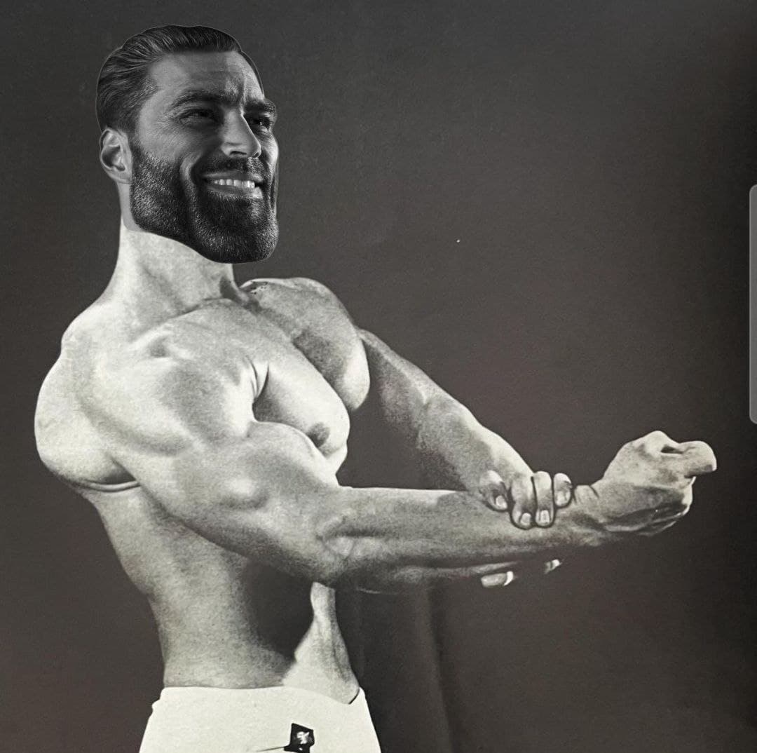 Muscular man flexing with a confident smile.