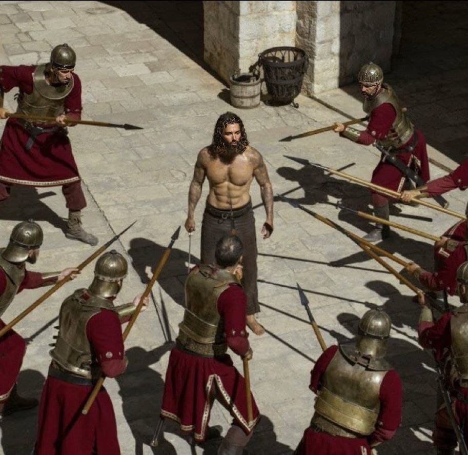 A strong man defies armed soldiers in an epic showdown.