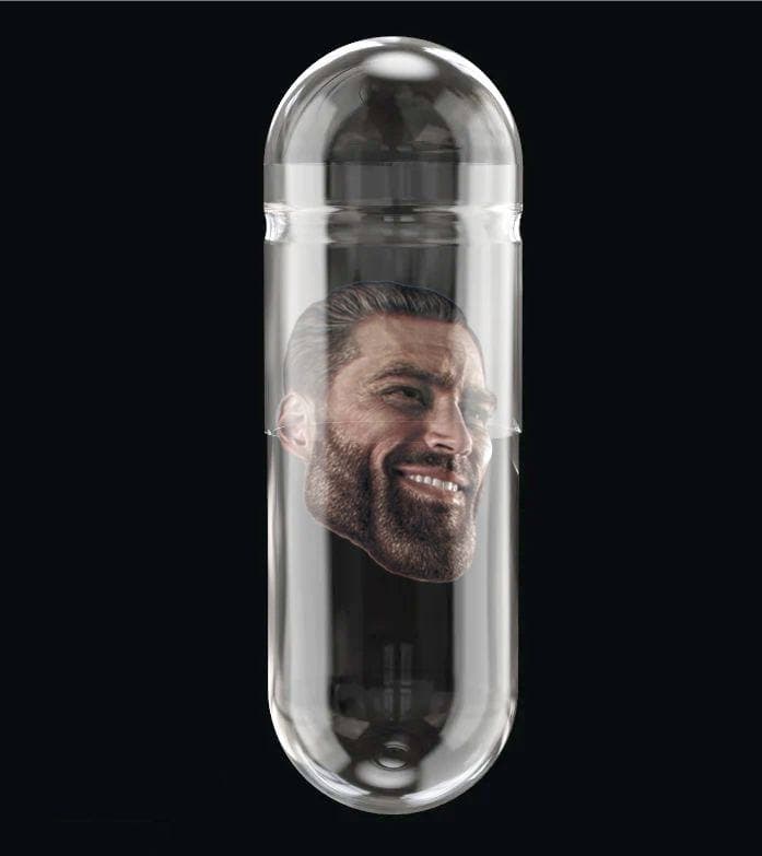 A smiling masculine face inside a transparent capsule.
