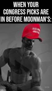 Muscular figure in a red cap celebrating congressional victory.
