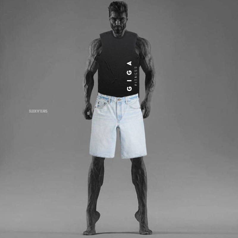Muscular man in tank top and shorts exuding confidence.