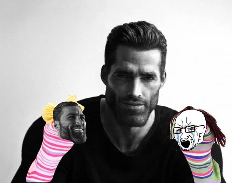 A serious man with two animated sock puppets beside him.