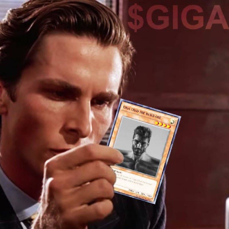 Man examining a card of Giga Chad, deep in thought.