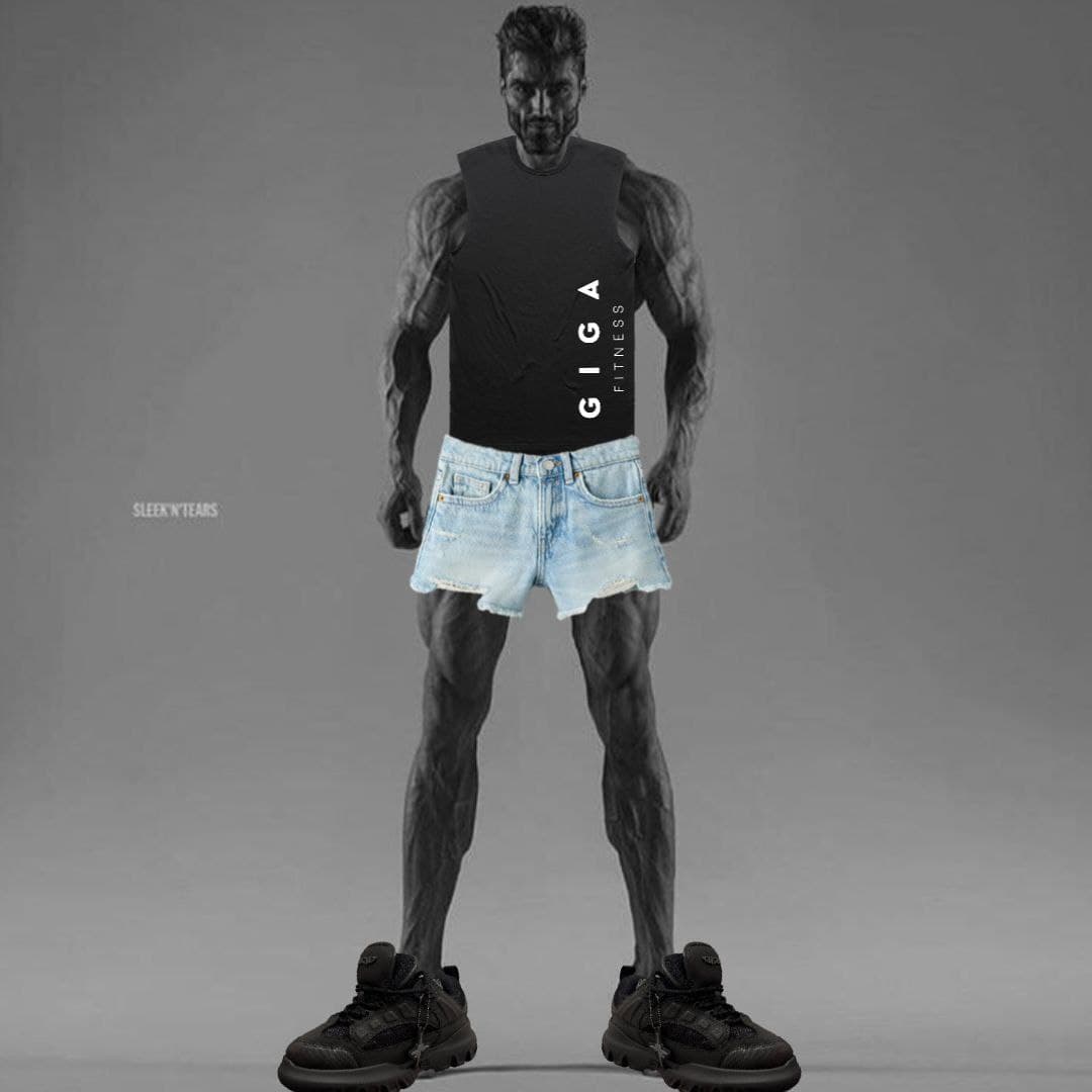 Muscular man in sleeveless shirt and denim shorts.