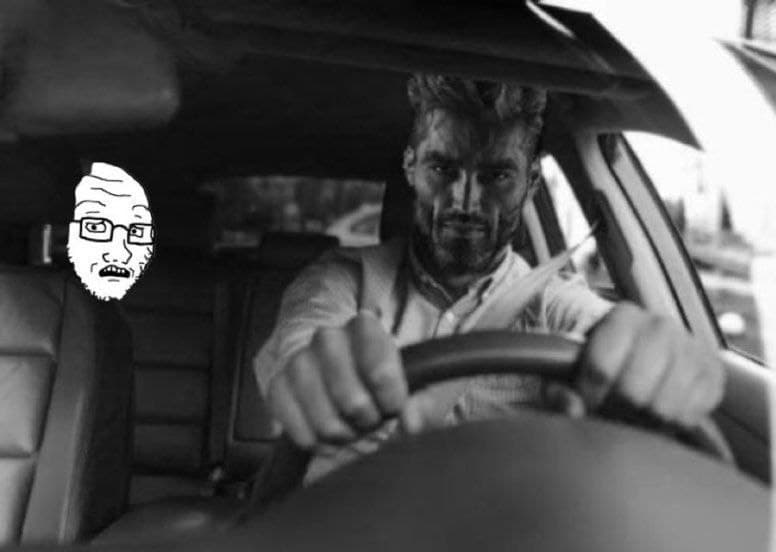 A confident man driving with a scared cartoon face next to him.