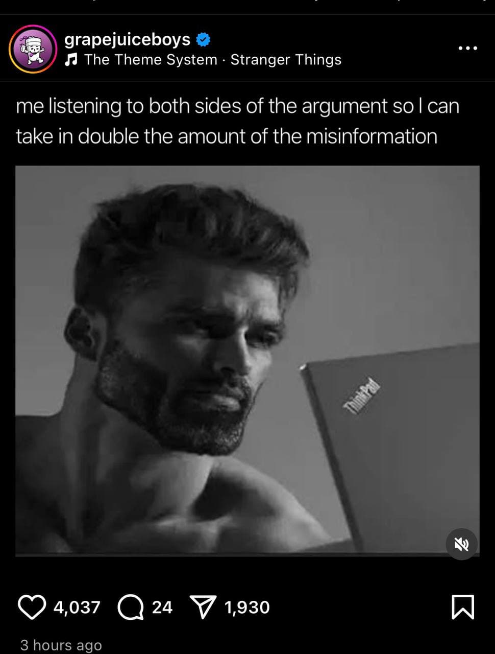 Muscular man carefully listens to arguments on his laptop.