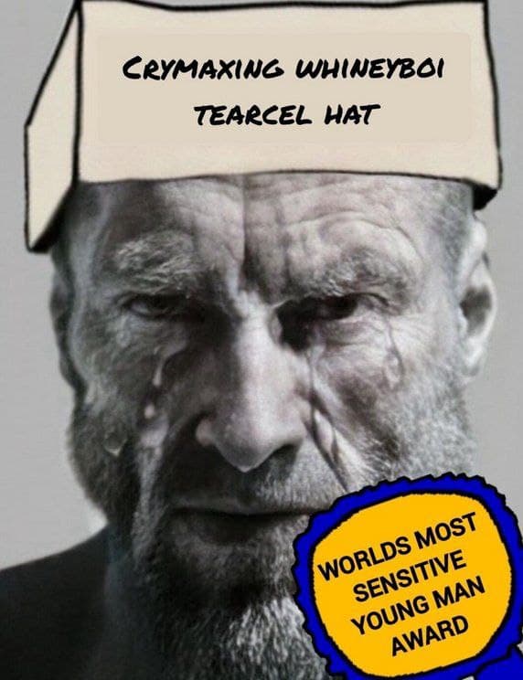 Man with distressed look and ironic award hat.