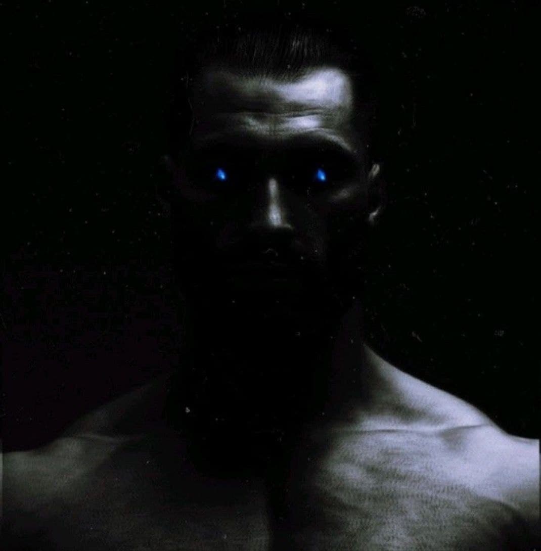 Muscular figure with glowing blue eyes in dark background.