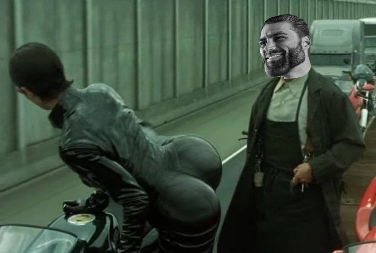 GigaChad admires a biker in leather gear.