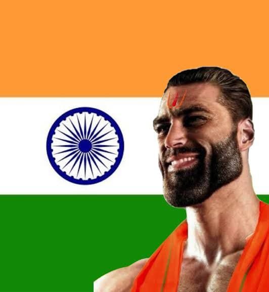 Muscular man in front of Indian flag, exuding confidence.