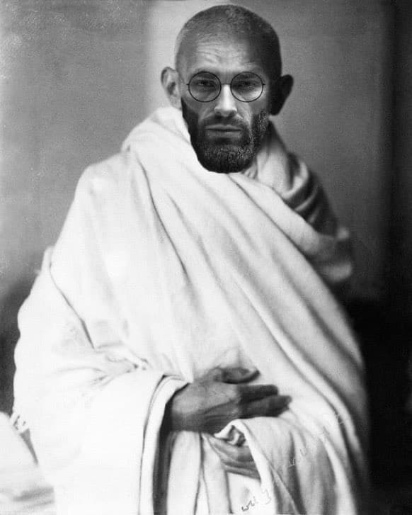Humorous edit of a historical figure with a muscular man's head.