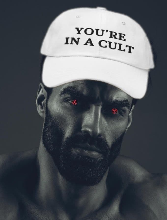 Muscular man in a cult hat with red eyes.