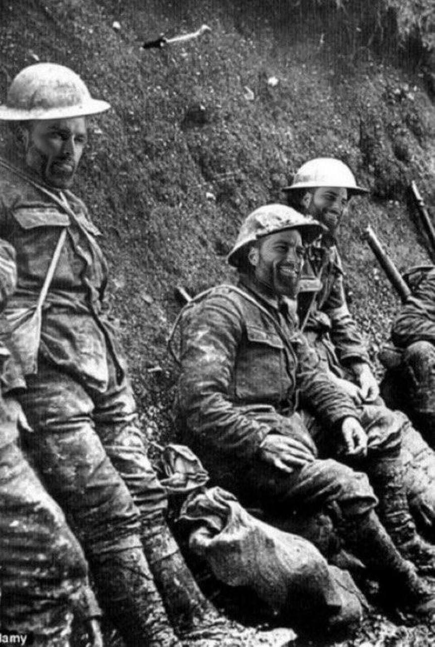 Soldiers in a trench with GigaChad faces humorously edited.