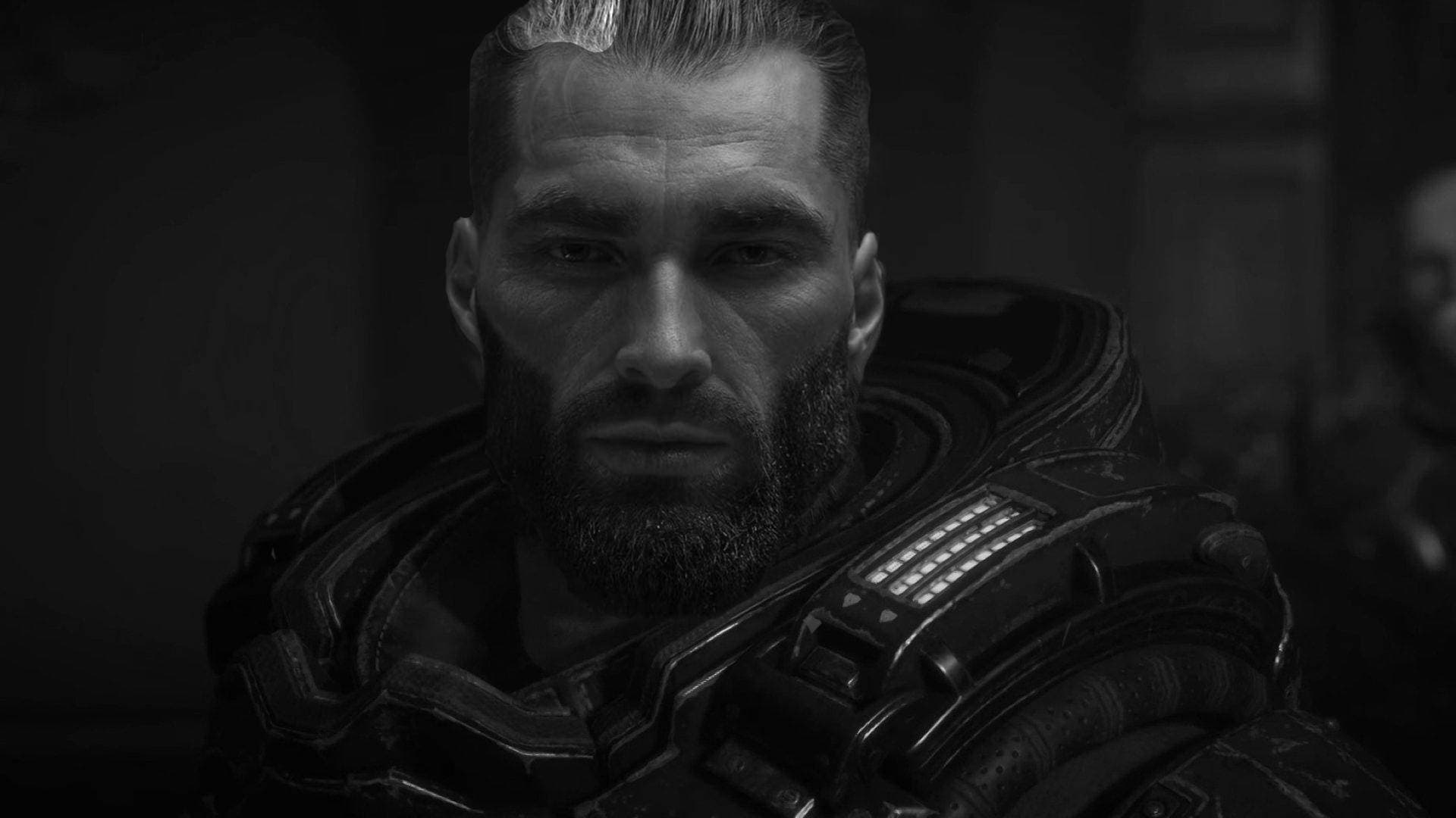A muscular man in futuristic armor with a serious expression.