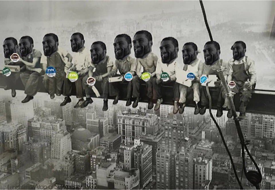 Men with GigaChad faces sitting on a beam above a city.
