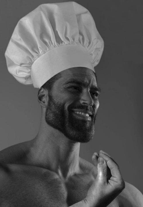 Muscular man in a chef's hat smiling confidently.