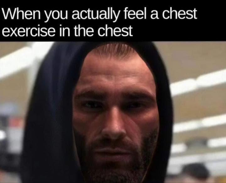 Muscular man contemplating chest exercise intensity.