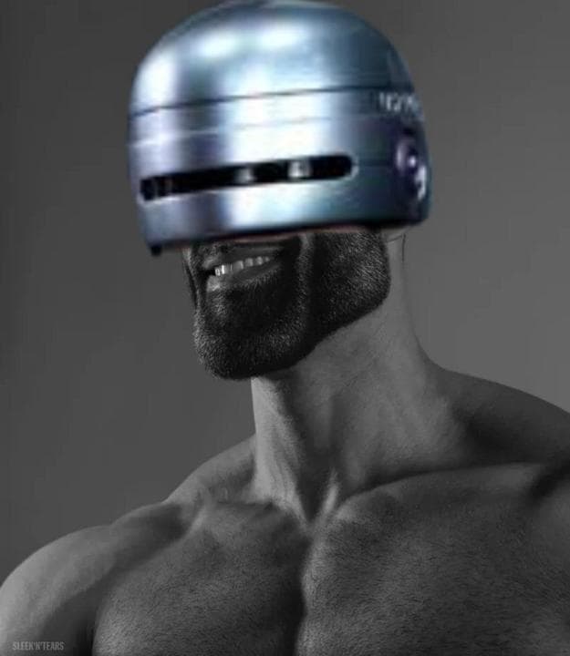 Muscular man with robotic helmet smiling confidently.