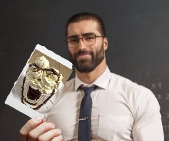 Muscular man holding a photo of an ice cream sundae.