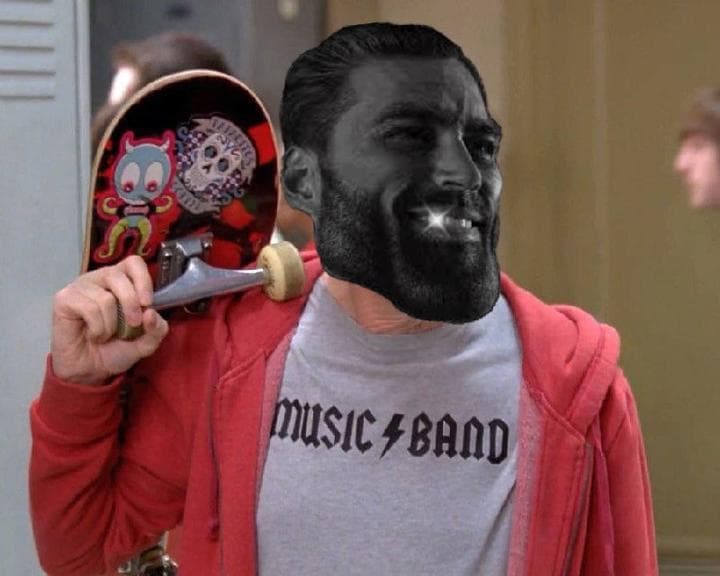 Man with GigaChad face holding a skateboard.