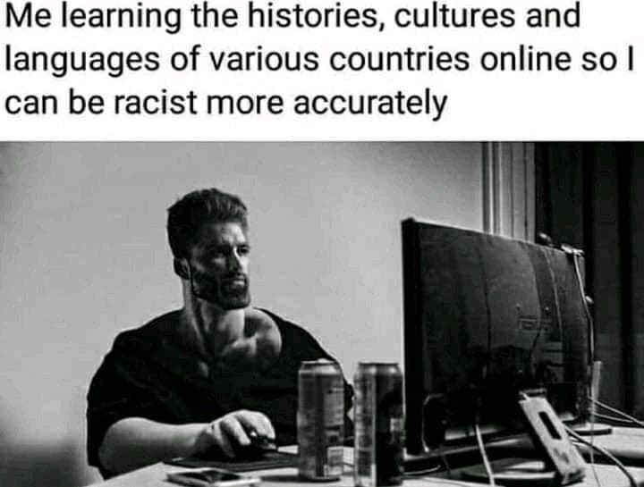 A man studying cultures on a computer with a ironic caption.