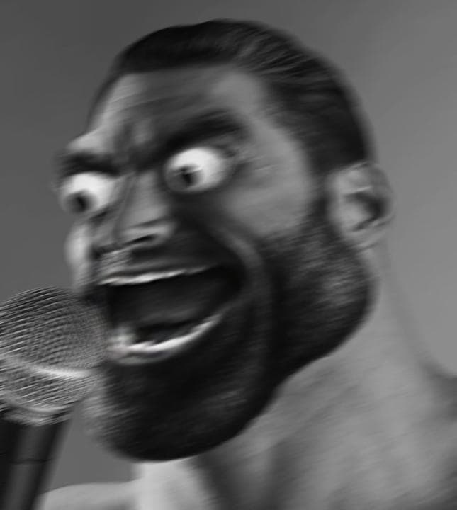 Muscular man shouting into a microphone with exaggerated expression.