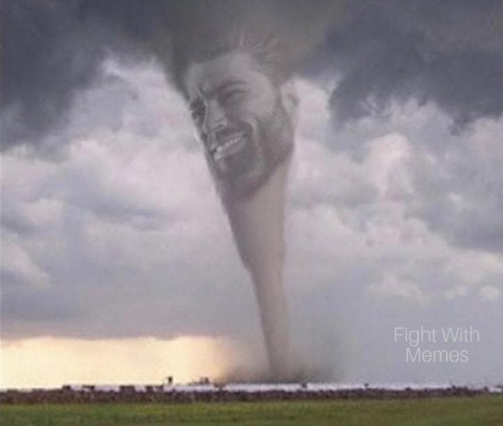 A tornado with a smiling man's face appearing in clouds.