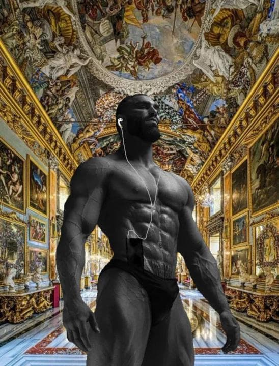 Muscular man with earbuds in an ornate art gallery.